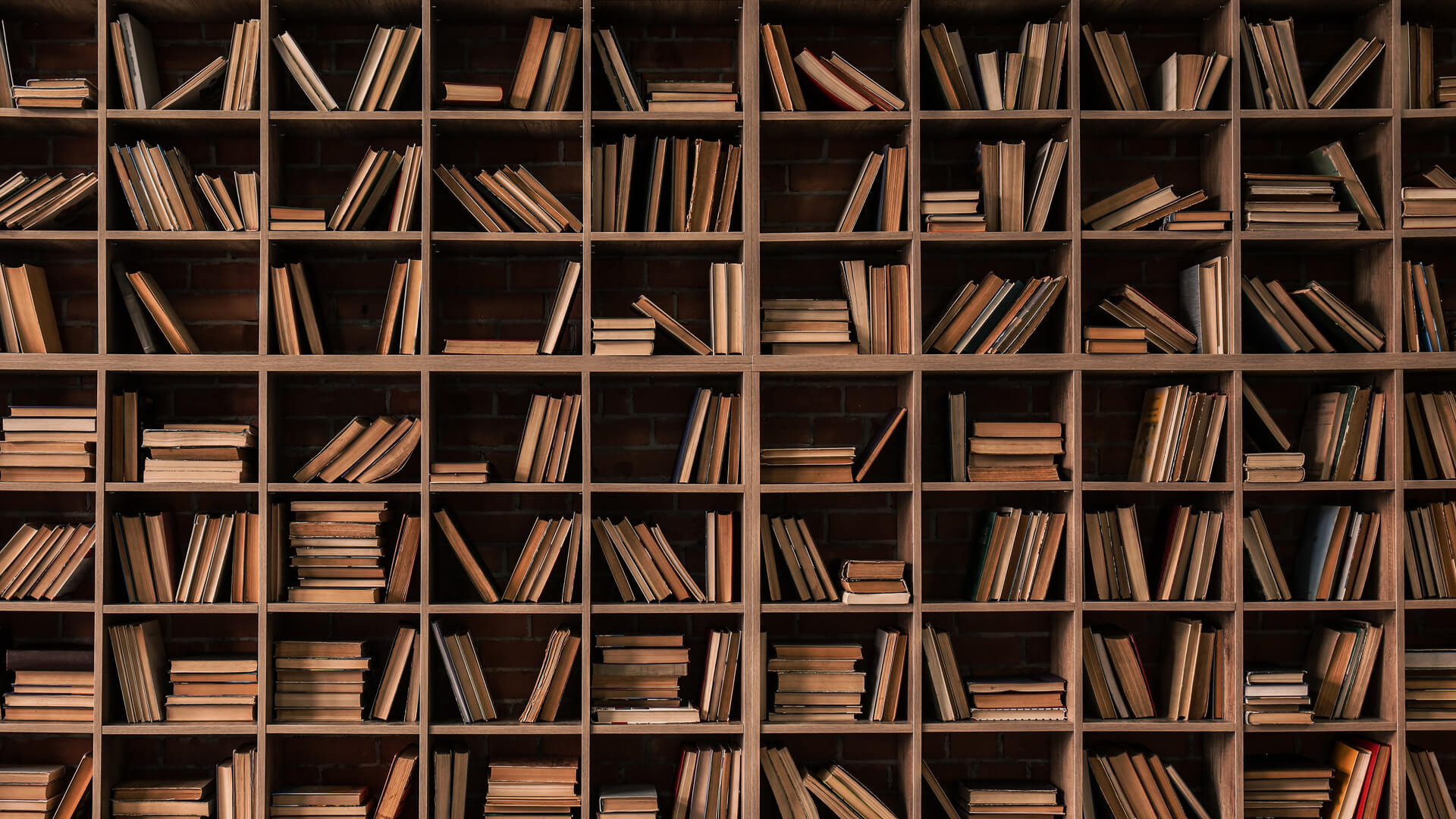 Square, wood cubbies holding old books
