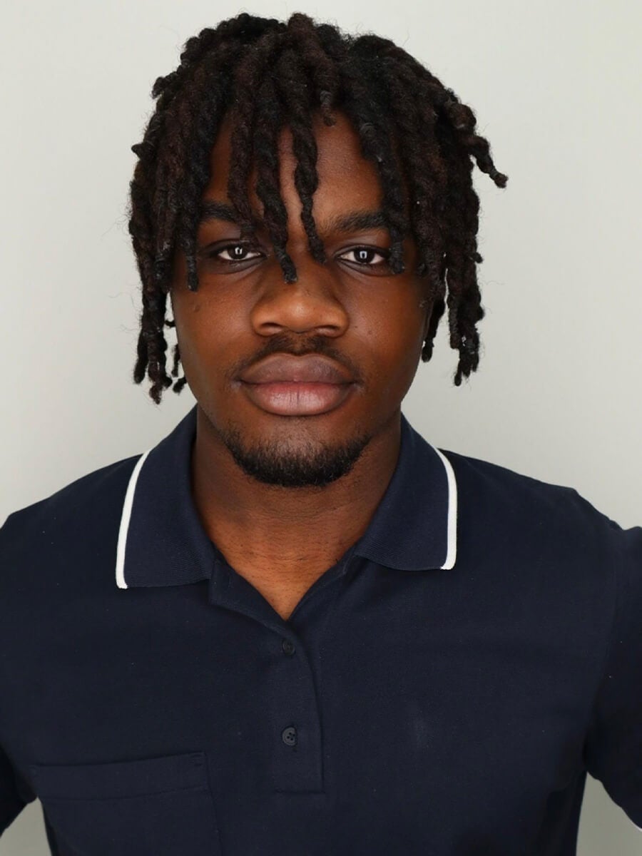 Headshot of a student wearing a black shirt
