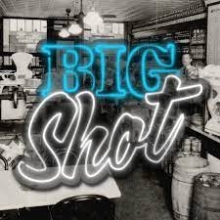 "BIG Shot" in blue and white neon overlaid on a black and white photograph of a deli