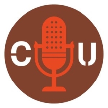 orange microphone with letter C on left and U on right against brown backdrop