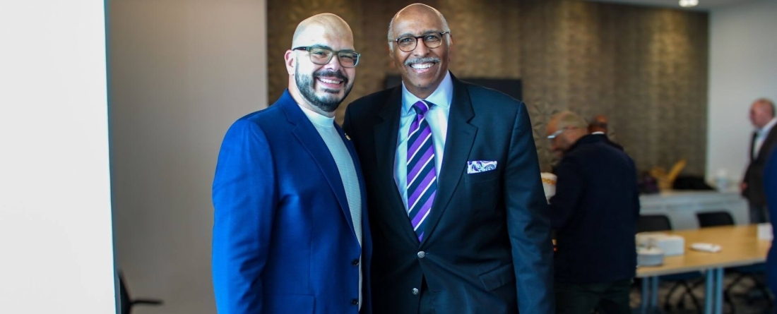 John Ronquillo stands with Michael Steele