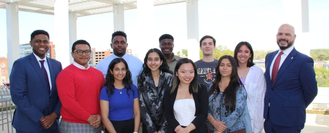 Cullen Merritt (left) and John Ronquillo (right) pose with Thurgood Marshall fellows