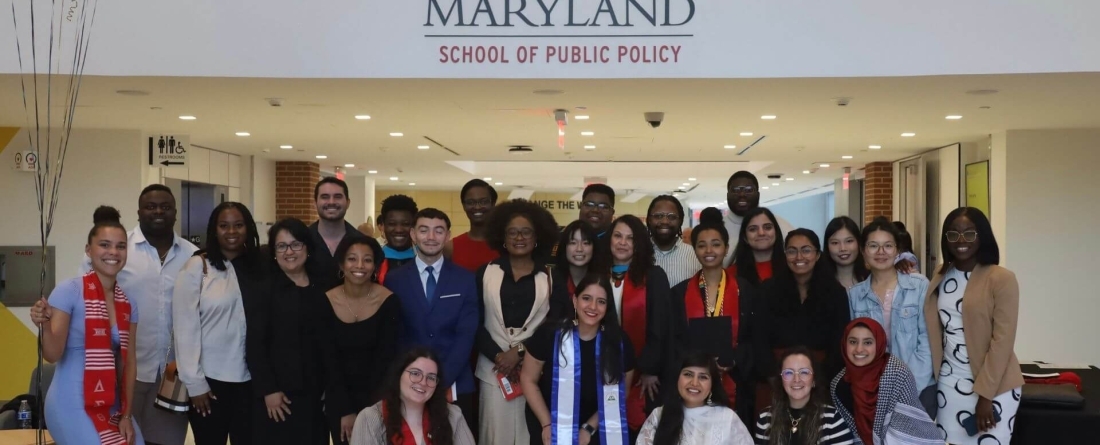 group of students standing together in atrium of Thurgood Marshall Hall at MOSAIC event