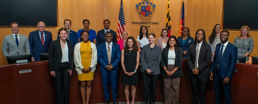 Justin Nixon poses with the Montgomery County Council