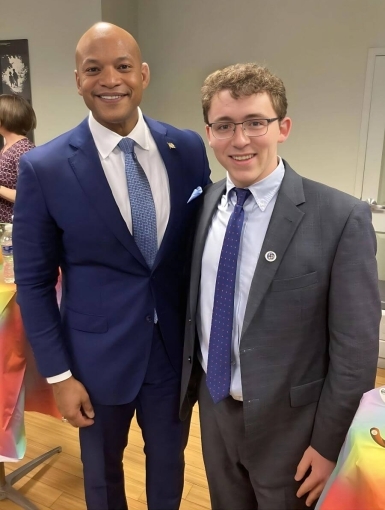 Wes Moore and Eli Brennan standing together